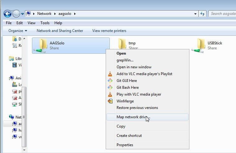 Windows File Explorer showing the aagsolo network location with its three shares, AAGSolo, tmp and USBStick. AAGSolo is right-clicked and Map network drive is highlighted in the context menu.
