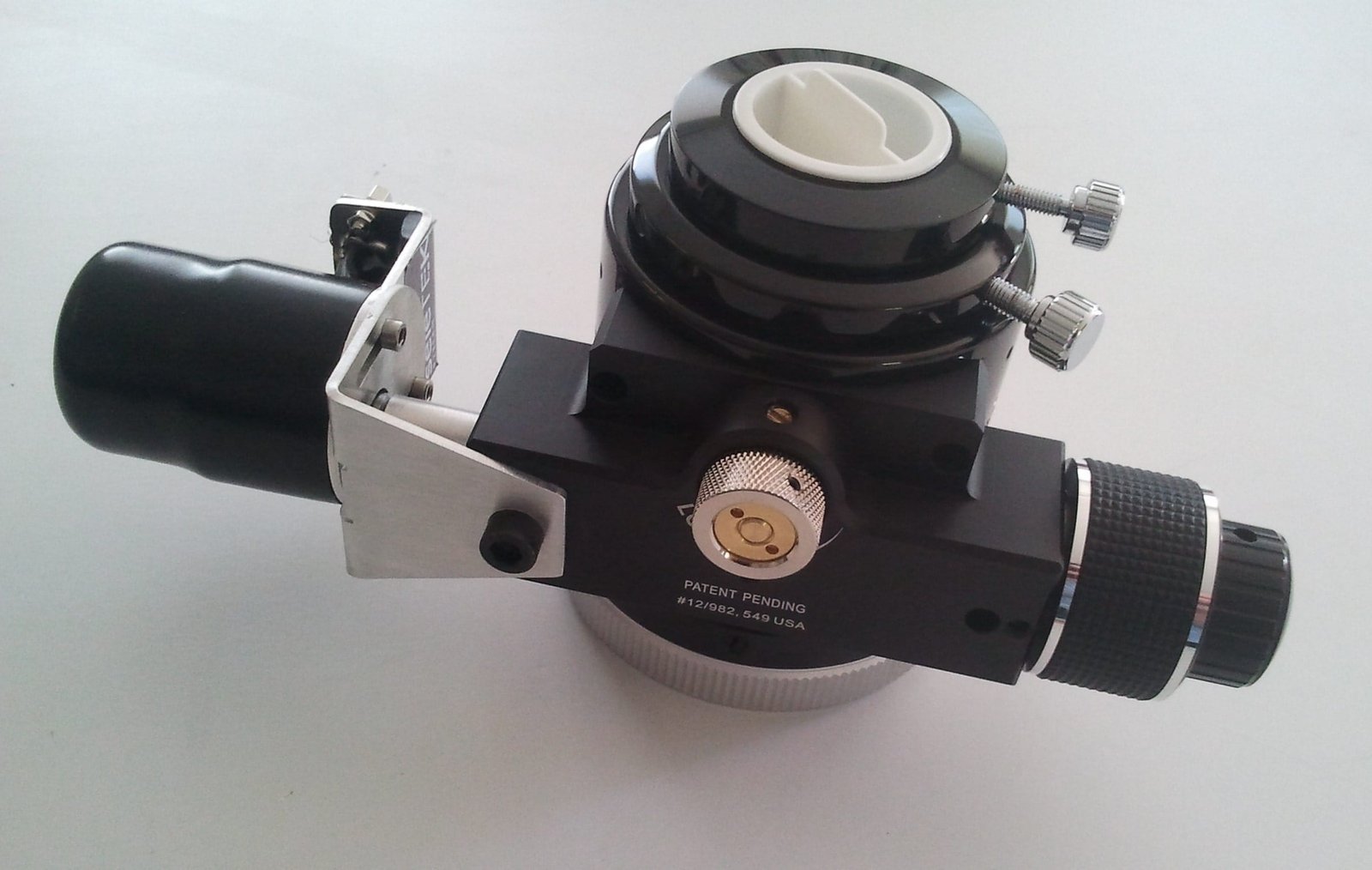 A Tecnosky focuser with a Lunatico plate and cylinder and the motor fitted