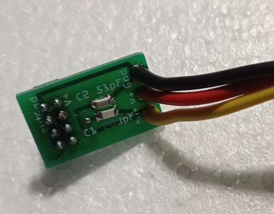 The supplied board soldered to the black, red and yellow wires