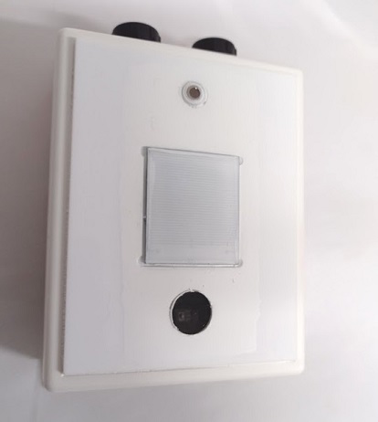 The unit with all covers removed: IR sensor, light sensor window and rain sensor now visible again
