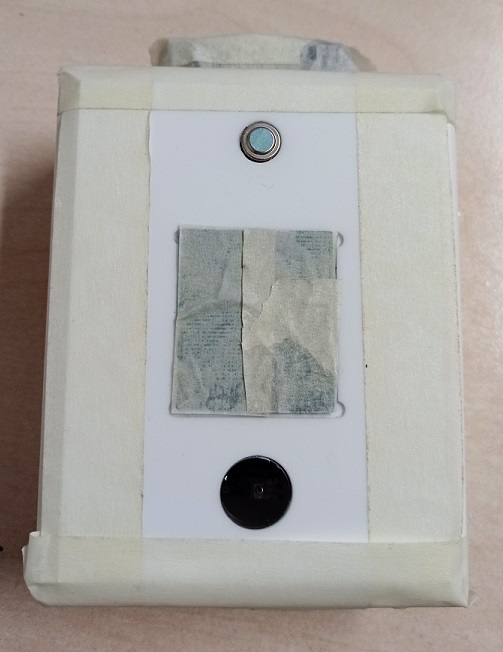 The CloudWatcher unit fully masked, with the IR sensor sticker and rain sensor covered, and the connectors taped off