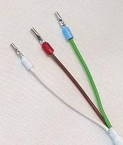 The Sharp IR distance sensor's three wires: green, brown and white