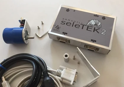 An Armadillo seleTEK controller with its stepper motor, mounting bracket and cables