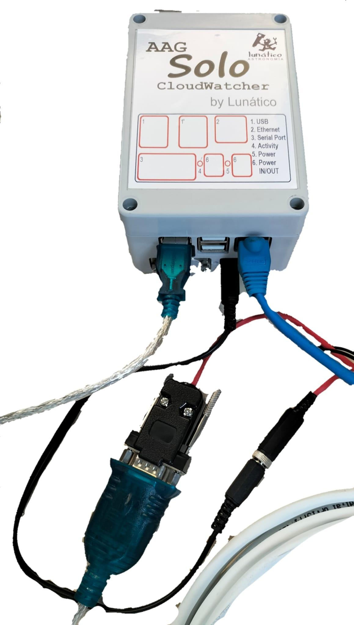 Underside of the SOLO model R with all connections made: USB serial adapter, ethernet, power, and the CloudWatcher's power cable