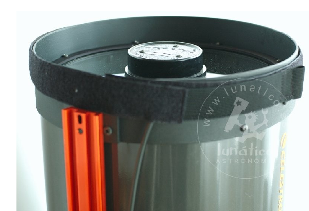 Heater band fitted around the front of a telescope tube, secured with Velcro
