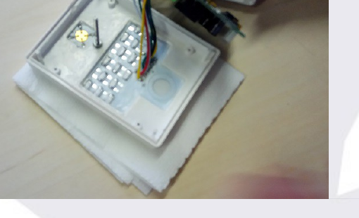 Sensor placed over the ventilation hole area, protected with a paper napkin
